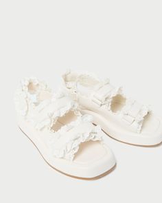 Two-band chunky platform sport sandal with velcro straps in white leather. Features a padded leather footbed, an open toe, and an adjustable heel strap. 1.25-inch platform. Bridal Journal, Leather Platform Sandals, Caramel Color, White Sandals, Loeffler Randall, Kids Sandals, Chunky Platform, Sport Sandals, Cool Boots