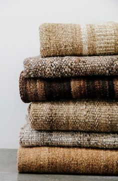 a stack of towels sitting on top of each other