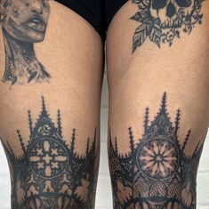 a woman's thigh with tattoos on it