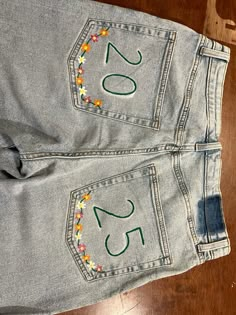 senior 2025 Class Of 2026 Painted Jeans, Swnior Jeans, Senior Jean Ideas Painted, 2025 Jeans Senior, Senior Overalls Ideas 2024, Cute Painted Jeans School Spirit, Class Pants Ideas, Senior Sweatpants Ideas