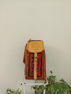 Very Beautiful medium to large women's leather backpack boho. This multicoloured backpack has been handmade from genuine leather and colourful woollen embroidery. This Rucksack has 70s vintage look but it is a newly crafted hippie backpack, ideal for festivals, concerts, travelling and as an evening backpack. Echtes leder Rucksack, Schönes Kunstwerk. This Vintage Bohemian backpack has an adjustable Shoulder straps, buckles at the front and a small pocket outside and one pocket inside. This is a Traditional Multicolor Backpack For Travel, Daily Use Multicolor Leather Backpack, Bohemian Leather Backpack For Everyday Use, Multicolor Rectangular Leather Backpack For Everyday Use, Bohemian Leather Backpack For Everyday, Bohemian Leather Backpack With Adjustable Strap, Multicolor Rectangular Leather Backpack With Adjustable Strap, Multicolor Leather Standard Backpack, Everyday Bohemian Leather Backpack