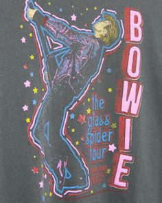 Rock out with the original king of transformation in our Women's David Bowie Glass Spider Tour Vintage Tee in Vintage Black.  The multi-colored graphic is front and center on our signature Vintage Tee.  This tee is made of super soft 100% cotton and features destruction details, like distressing on the neck, sleeve and hem. Shop the rest of our David Bowie Collection HERE and Shop the rest of our Music Collection HERE. 80s Graphic Tees, Vintage Tees Women, Womens Vintage Tees, David Bowie Shirt, Artist Merch, Vintage Rock Tees, Glass Spider, David Bowie Art, Vintage Band T Shirts