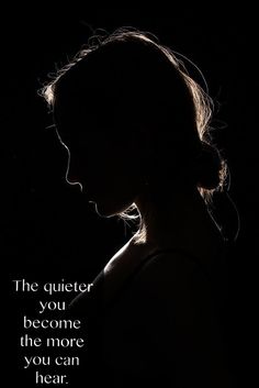 the silhouette of a woman's head with an inspirational quote above it that reads, the quieter you become the more you can hear