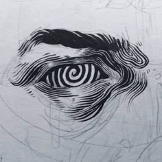 an eye drawn in black and white on paper