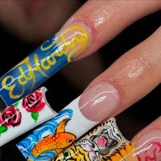 Licensed Nail Artist on Instagram: "Hand painted Ed Hardy🐯🌹🌊

Inspo taken from:
@paintedbypuree 
@sulysnailography 
@_nailedbyaunicorn_ @dakotawilliamtattoo 

Using: 
@apresnailofficial gel polish
@brothercosmetics gel polishes @nailprofus “Teddy” cover acrylic @swarovski crystals 
@nailprofus Topcoat

#edhardy #handpaintednails #handpaintednailart #tigernails #frenchtipnails #frenchtips #zebraprintnails #longnails #squarenails
#nailtech #nailreels #funnyreels #nailtechmemes #nailtechhumor #nailvideos #nailsnailsnails #nailart #frenchnails #tiktok #coachellanails #laquintanails #palmdesertnails #losangelesnails"