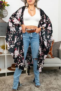 Flutter into fashion with our Floral Butterfly Sleeve Kimono! Featuring a beautiful butterfly print and flowy sleeves, this kimono is the perfect addition to any outfit. Soar with style and embrace your inner free spirit. Casual Black V-neck Kimono, Flowy V-neck Kimono For Day Out, Black Stretch Cover-up For Spring, Black Stretch Spring Cover-up, Chic Spring Loungewear Kimono, Casual Printed Kimono, Casual Printed Kimono For Brunch, Spring Black Long Sleeve Cover-up, Flowy Kimono For Spring Loungewear