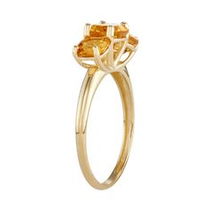 Decorated with a trio of cushion-cut gemstones, this 10k gold ring is an eye-catching accent to your favorite attire. Decorated with a trio of cushion-cut gemstones, this 10k gold ring is an eye-catching accent to your favorite attire. Click on this JEWELRY & WATCHES GUIDE to learn about fit, styles, materials and more! Width: 6 mm Metal: 10k gold Finish: polished Packaging: boxed CUBIC ZIRCONIA DETAILS Center stone size: 6 mm x 6 mm Shape: cushion cut Setting: prong Please note, a signature may Gold Stone Ring, 10k Gold Ring, Ring Cushion, Cushion Ring, Right Hand Rings, Gold Stone, Women's Flats, Cushion Cut, 10k Gold