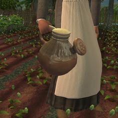 a woman in a white dress is holding a jug and watering the ground with her hands