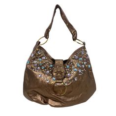 -Metallic Bronze Genuine Leather Hobo Bag -Jeweled Embellishment -Bronze Studded Detail -Bridge Snap Magnetic Closure -Black Cotton Lining With Zipper Pocket And Slip Pocket Inside -New With Tags -11 H X 9 L X 6 D With 12 Inch Strap 90s Shoulder Bag, Uni Room, Tooled Leather Bag, Embossed Bag, Embroidered Handbag, Gorgeous Outfits, Italian Leather Bags, Studded Bag, Metallic Purse