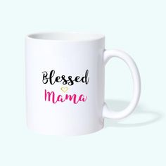 a white coffee mug with the words, blessed mama on it