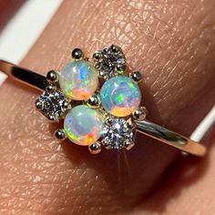 Open Cluster Ring With Birthstone For Promise, Fine Jewelry Stackable Opal Promise Ring, Stackable Opal Promise Ring In Fine Jewelry Style, 14k Gold Cluster Rings For Gifts, Dainty Round Cluster Promise Ring, Dainty Round Cluster Ring For Promise, 14k Gold Cluster Ring For A Gift, 14k Gold Cluster Ring Gift, 14k Gold Crystal Halo Ring For Promise