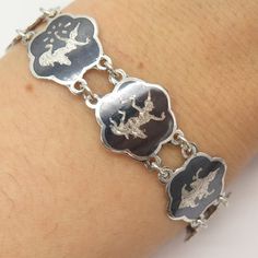 925 Sterling Silver Antique Siam Niello Hindu Goddess Panel Link Bracelet 6.5"Weight: 16.9gWELCOME TO PAWN SHOPWe are an actual pawn shop and have been in business for over 25 years.Since 1990, our establishment has been serving a variety of clients by providing them with short term cash solutions and options of liquidity regarding their treasured heirlooms.Acknowledging that today′s customers are very sophisticated and are looking for a variety of investments, our acquisitions are hand-picked f Engraved Sterling Silver Bracelet Collectible, Hindu Goddess, Pawn Shop, Tiffany Heart, Heart Charm Bracelet, Hand Picked, 25 Years, Link Bracelets, Vintage Jewelry