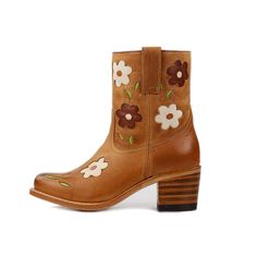 Step out in style with these chic brown cowgirl boots featuring square toes, intricate flower stitching details, and comfortable block heelsa perfect blend of fashion and Western flair for women. Color: Brown Heel Type: Block heel Heel Height: 2.36" / 60 mm approx Shaft Height: 6.69'' / 170 mm approx Product measurements were taken using size 8. Please note that measurements may vary by size. Toe: Square toe Stitching flowers design Pull-on design Handcrafted US sizing. Fits true to size. Brown Western Boots With Block Heel, Western Style Brown Mid-calf Boots For Spring, Brown Country Style Heeled Boots For Fall, Country Style Brown Mid-calf Boots For Fall, Spring Brown Snip Toe Mid-calf Boots, Brown Snip Toe Mid-calf Boots For Spring, Spring Brown Mid-calf Snip Toe Boots, Western Style Square Toe Mid-calf Boots For Spring, Brown Block Heel Boots For Spring