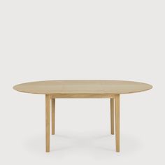 an oval wooden table with two legs and a circular top, on a white background