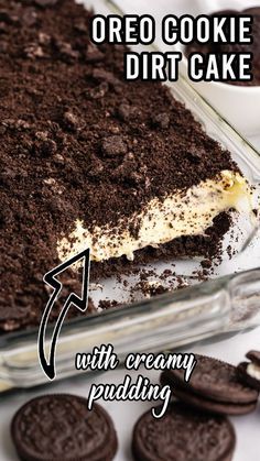 oreo cookie dirt cake with creamy pudding in a glass baking dish on a white table