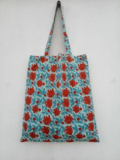 Cotton Carry (Market Bag) made of 100% Cotton Indian Handbook Print fabric. These we make in assorted colors and designs. Stitching quality is very nice. Size: 45 x 40 cms. Red Rectangular Lunch Bag For Travel, Rectangular Red Lunch Bag For Travel, Eco-friendly Red Gift Bag, Red Rectangular Laptop Bag For Daily Use, Eco-friendly Pouch Bags For Daily Use, Square Travel Bag For Gifts, Square Gift Bag For Travel, Rectangular Lunch Bag With Adjustable Strap For Daily Use, Travel Tote Gift Bag