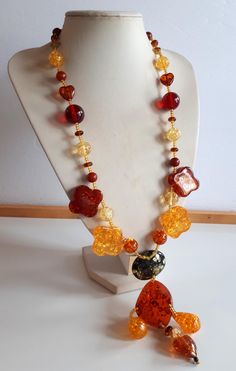 Statement bold Vintage yellow red orange cognac lucite plastic with inclusions station pendant necklace with huge beads . Good vintage  condition - sold as is - return not accepted.  To make this a smooth and pleasant transaction experience for everyone, all buyers need to read and understand the description, the terms of sale , the payment and the shipping indicated in this listing. Return not accepted - please ask before purchase. Vintage Yellow, Cognac, Beaded Necklace, Accessory Gift, Jewelry Necklaces, Electronic Accessories, Pendant Necklace, Purses And Bags, Beads