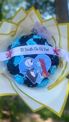 a decorated cupcake with an image of the little mermaid on it