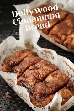 two cinnamon breads sitting on top of a wire rack next to each other with the words dollywood cinnamon bread