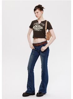 Brim with the spirit of boho chic in this raw-edged t-shirt, perfect for the fashionista with a penchant for the unconventional. The earthy brown hue sets a laid-back canvas for the intricate, vintage-inspired crest design that commands attention. With a distressed finish along the hem and sleeves, this cropped top pairs effortlessly with denim for an outfit that speaks of casual, carefree days. It’s not just a piece of clothing; it’s a statement of individuality and style.Main fabric compositio Bohemian Distressed Short Sleeve T-shirt, Crest Design, Earthy Brown, Short T Shirt, Cropped Style, Dark Background, Cropped Top, Types Of Collars, Piece Of Clothing