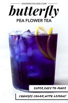 a purple drink in a glass with lemon wedges on the rim and text that reads, butterfly pea flower tea