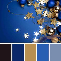 a blue and gold color scheme with christmas balls, stars and baubles on it