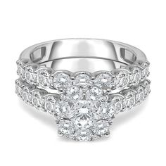 a white gold ring set with round diamonds