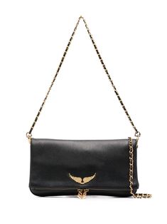 This Zadig&Voltaire shoulder bag is crafted from black calf leather. It features gold-tone hardware, a gold-tone logo plaque, a chain-link shoulder strap, a foldover top with magnetic fastening, and a main compartment. It can be worn on the shoulder or crossbody. Gold Bag, Fancy Bags, Stockholm Fashion, Star Girl, Black Bag, Chain Bags, Leather Crossbody Bag