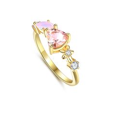 Our Love Struck Ring is sterling silver .925 plated in yellow gold with white and pink cubic zirconia stones. Derived from Old Norse, Erica means ‘eternal ruler,’ reminding us that we are the rulers of our hearts. This asymmetrical ring features a heart-shaped stone and a pink shard about it pierce it with sparkling flowers accents. Please note that this is plated jewelry and will need to be re-plated after 1-2 years with proper care. This order will take around 1-2+ weeks to package and process Sparkling Flowers, Asymmetrical Ring, Love Struck, Cute Pjs, Old Norse, Pink Ring, Jewelry Plate, Promise Rings, Our Love