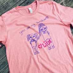 Bella Canvas, super soft and comfortable tee. Create a one of a kind t-shirt gift with your children's artwork or a loved ones art/handwriting. Artwork works best with one color (but I can work around multiple colors) and on unlined paper. Makes a special gift for that special someone! Perfect for mother's day or father's day! Unisex Pink T-shirt With Custom Print, Casual Tops With Custom Artwork For Gift, Casual Tops With Custom Artwork As Gift, Unisex Cotton T-shirt For Gift, Tri-blend T-shirt With Custom Artwork, Tri-blend Short Sleeve T-shirt With Custom Artwork, Short Sleeve T-shirt With Custom Artwork As Gift, Custom Artwork Short Sleeve T-shirt For Gift, Unisex Pink T-shirt With Funny Print