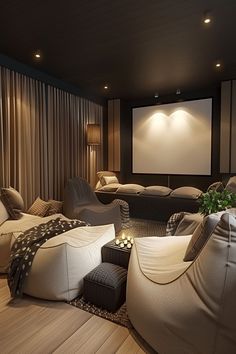 a living room filled with furniture and a projector screen in the middle of it