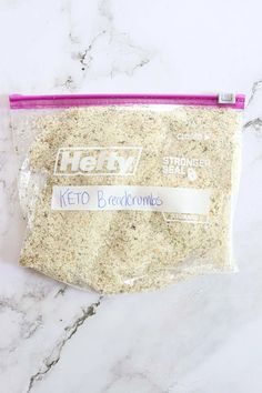 a bag of keto breadcrumbs sitting on top of a marble counter