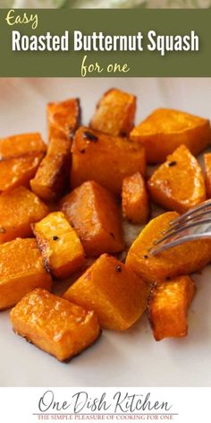 roasted butternut squash on a white plate with a fork and text overlay that reads easy roasted butternut squash for one