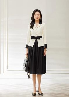 Look no further than these Elegant Black and Cream Skirt Suits for the perfect combination of professionalism and chic elegance. The perfect workwear for the modern woman, these suits offer ultimate sophistication and unsurpassed comfort. Buy now and look your best for any business or social occasion. Peak lapels; front button blazer V-Neck, Long sleeves; Structured shoulders. Blazer and Pant Polyester 94% Spandex 6% Lining: Polyester 100% Imported Brand - AD&KM® Model Number - S1510, S13127, C1 Cream Skirt, Skirt Suits, Black And Cream, Look Your Best, Blazer Buttons, Skirt Suit, Modern Woman, The Modern, Work Wear