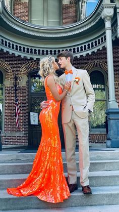 Orange Hoco Dress With Date, Blue And Orange Prom Couple, Orange Hoco Couple Outfits, Tux To Match Orange Prom Dress, Prom Dress And Tux Ideas, Prom Outfit Ideas For Couples, Orange Dress Prom Couple, Prom Color Themes Couples, Prom Couples Outfits Orange