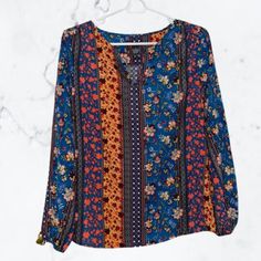 New With Tags- Chelsea & Theodore Top Boho Chic Bohemian Print Design V- Neck Opening Colors: Blue, Orange, Black, White, Red Size: Xs Blue Top With Vibrant Print For Fall, Blue Tops With Vibrant Print For Fall, Vibrant Orange V-neck Top, Vibrant Blue Long Sleeve Tops, Blue Blouse With Vibrant Print For Fall, Red Floral Blouse, Lace Sleeve Blouse, Blue Drapes, Slim Blouse