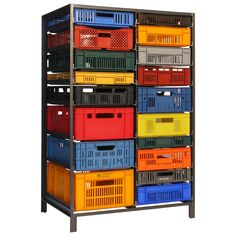 a metal shelving unit filled with lots of different colored bins