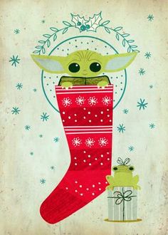 a christmas stocking with a baby yoda in it and a frog sitting next to it