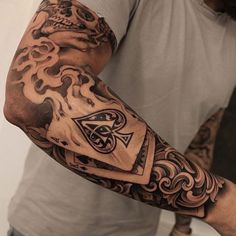 a man with a tattoo on his arm