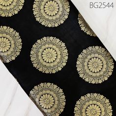 Crafting Costume Fabric Black Brocade Banarasi Fabric for Wedding Dress Home Decor Table Runner Cushion Cover by the Yard Indian Fabric. This is a beautiful banarasi blended silk brocade mandala design fabric in Black and Gold. ➤Product: Brocade Fabric ➤Fabric Type: Blended Silk (Viscose and Silk) Fine quality Zari Brocade Weaving from Banaras ➤Color: Black and Gold ➤Width: 44 inches. ➤Condition: New ➤ Code: bg2544 ➤Listing for 1 Yard of fabric. ➤Care: Dry Clean Only You can use this fabric to make Dresses, Tops, Blouses, Jackets, Crafting, Clutches or Evening Bags, embellish your clothes, Pillows, Drapery, Home Décor, Outdoor, Quilting, Sewing, General, Upholstery etc use it for scrap booking projects. If you purchase more than 1 Yard you will get it in running length, not in pieces. Plea Black Banarasi Silk Traditional Wear For Wedding, Elegant Black Brocade Dupatta, Black Brocade Dupatta For Wedding, Black Dupatta With Traditional Patterns For Wedding, Black Wedding Dupatta With Traditional Patterns, Black Wedding Sets With Traditional Patterns, Black Brocade Sets For Wedding, Black Brocade Wedding Sets, Cocktails Dresses