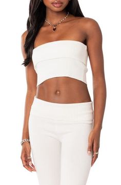 Show off your shoulders in this svelte strapless crop top knit with cozy ribbing for easy comfort. Strapless 100% acrylic Hand wash, dry flat Imported Casual Ribbed Bandeau Crop Top, Casual Ribbed Strapless Tube Top, Spring Ribbed Bandeau Crop Top, Trendy Ribbed Bandeau Crop Top, Stretch Strapless Tube Top For Loungewear, White Seamless Knit Crop Top, Solid Bandeau Tube Top For Loungewear, Fitted Strapless Ribbed Crop Top, Strapless Ribbed Fitted Crop Top