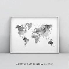 a black and white watercolor map of the world is featured in this minimalist poster