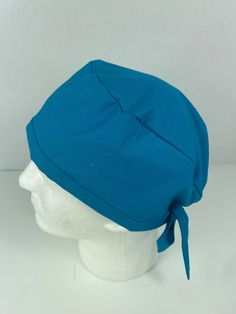 Simple, streamlined, and comfortable Skull Cap design! This classic style accommodates short to medium length of hair. Made out of 100% cotton. Cap size is standard. Cap has an elastic on the back for size adjustment Foldable trim allows for depth adjustment. Cotton Beanie Hat With Sweatband, Cotton Beanie With Sweatband, Cotton Beanie With Cotton Sweatband, Cotton Bonnet Cap, Fitted Solid Cotton Hats, Fitted Cotton Hats In Solid Color, Fitted Cotton Hat In Solid Color, Fitted Solid Color Cotton Hats, Basic Cotton Beanie Hat