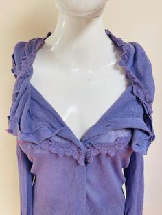 Beautiful lavender ladies cardigan with a stunning lace trim collar.  Semi-sheer & lightweight. So pretty & femme!  💥Condition: Excellent vintage condition.  Please see measurements before buying. Measurements are taken while the garment is lying flat. Please double where appropriate for actual dimensions. Approximate Measurements (lying flat):  Armpit to Armpit:  Width of Bottom Hemline:  Length from Top of Shoulders to Bottom Hem:  Buy the Look!  Black Pleather Skirt for Sale Here:  https://w Fitted Casual Cardigan With Lace Trim, Winter Lace Trim Cardigan For Layering, Fitted Lace Trim Cardigan For Layering, Winter Cardigan With Lace Trim For Layering, Winter Layering Cardigan With Lace Trim, Fitted Crochet Trim Cardigan For Fall, Fitted Cardigan With Crochet Trim For Fall, Fitted Fall Cardigan With Crochet Trim, Fitted Purple Cardigan For Layering