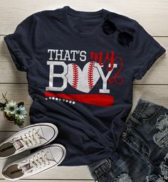 Women's Baseball T Shirt That's My Boy Shirts Baseball Mom Tee Son Tshirt Be loud and proud in this women's baseball t shirt. It simply reads 'That's My Boy' and features a baseball in the shape of a heart. Let everyone know your son plays ball. A great shirt for game day as well as other days he's not on the ball field. Made of soft ring spun cotton and includes a cotton muslin drawstring gift bag. Direct to garment printed using the latest technology. Soft, ring spun cotton. Customer satisfact Cotton T-shirt With Baseball Season Lettering, Game Day Letter Print T-shirt For Baseball Season, Blue Letter Print Top For Baseball Season, Graphic Tee With Lettering For Baseball Season, Cotton Baseball Jersey With Letter Print And Crew Neck, Baseball Season Sports T-shirt With Slogan, Cotton Slogan Top For Baseball Season, Blue T-shirt With Letter Print For Baseball Season, Baseball Season Sports Slogan T-shirt