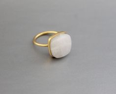 ♦♦ Beautiful handcrafted ring ◘Stone Information: Genuine White Agate - Cut: Cushion Size: 13 mm ◘ Metal: 925 Sterling Silver ◘ Band: 1.5 mm ◘ Setting: Open back bezel setting ◘ Finish: High polish (shiny) ◘ Nickel free ◘ Anti tarnish ◘ Vermeil Gold ◘ Handmade band: 14 gauge solid sterling wire This ring is adorably rustic, easy to wear, & stackable! ◘Please Note - The Ring in the Picture can be available or Sold out. Every Ring is Made of a Unique Gemstone. Therefore, Colors and Inclusions Minimalist Natural Stone Rings As Gifts, Minimalist Natural Stone Rings Gift, Minimalist Crystal Ring With Natural Stones As Gift, Minimalist Crystal Ring With Natural Stones For Gift, Minimalist Moonstone Ring With Natural Stones For Wedding, Minimalist Moonstone Ring With Natural Stones As Gift, Minimalist Natural Stone Moonstone Ring As A Gift, Minimalist Moonstone Ring With Natural Stones, Handmade Minimalist Moonstone Wedding Ring