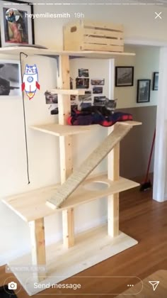 there is a shelf made out of wooden planks