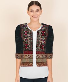 Experience Fashionable elegance with this Mashroo Cotton Silk Kutchi hand embroidered mirror work Jacket crafted from superior cotton silk blend for comfort and breathability. The Kutchi hand embroidered on its front crafted by artisans of Kutch which reflects of colourful Kutch. Look & feel your best with this timeless piece. Transitional Long Sleeve Choli, Fitted Nehru Jacket With Embroidered Border For Festivals, Traditional Fitted Outerwear With Embroidered Border, Festive Outerwear With Woven Motifs, Traditional Fitted Nehru Jacket With Embroidered Border, Fitted Traditional Outerwear With Embroidered Border, Bohemian Black Choli For Festivals, Bohemian Fitted Outerwear With Intricate Embroidery, Black Bohemian Choli For Festive Occasions