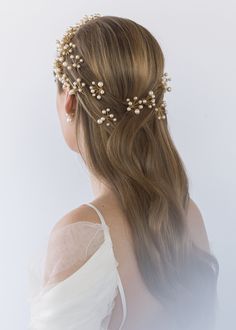 The Primavera Hair Pins were inspired by the ethereal essence of a Botticelli painting. Each pin in this set of three is comprised of numerous Swarovski pearls, which are meticulously strung by hand in our Brooklyn studio, creating a diaphanous spray of pearls with the illusion they're floating in midair. Consider pairing with the matching Primavera Circlet, or mixing with the Perla Bobby Pins. Packaging Dimensions: 6.5 x 6.5 x 1.75 inches Weight: Pins Packaging, Botticelli Paintings, Bridal Hairpins, Ethereal Essence, Pearl Hairpin, Bohemian Wedding Hair, Luxury Hair Accessories, Jennifer Behr, Luxury Hair