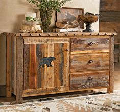 a wooden cabinet with an animal motif on it